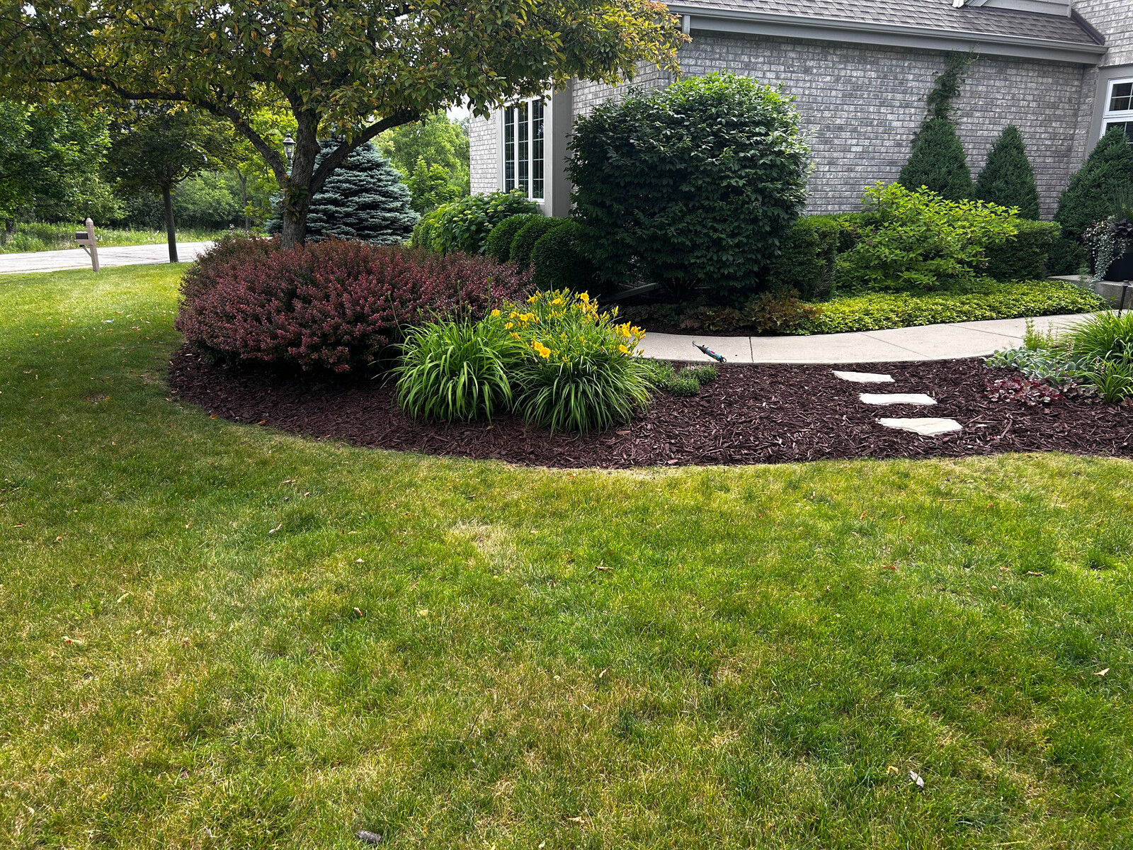 Yard cleanup and debris haul-off in Ozaukee County